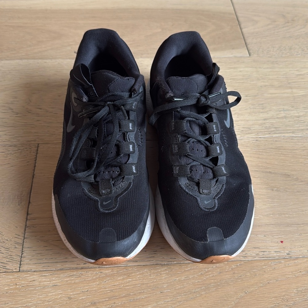 Woman’s Nike Running Shoes — Size 7